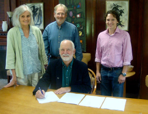Clockwise from front: Goddard College President Robert P. Kenny, Goddard faculty member and Sustainability Team member Catherine Lowther, Goddard Board Chair Avram Patt, and groSolar Business Development Associate Lincoln Lande