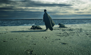 Photograph of woman on beach.
